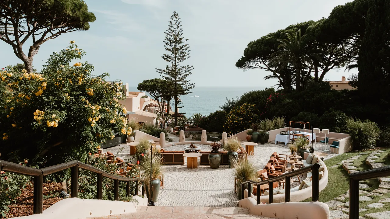 Praça das Rosas with the fire pit and the sea beyond